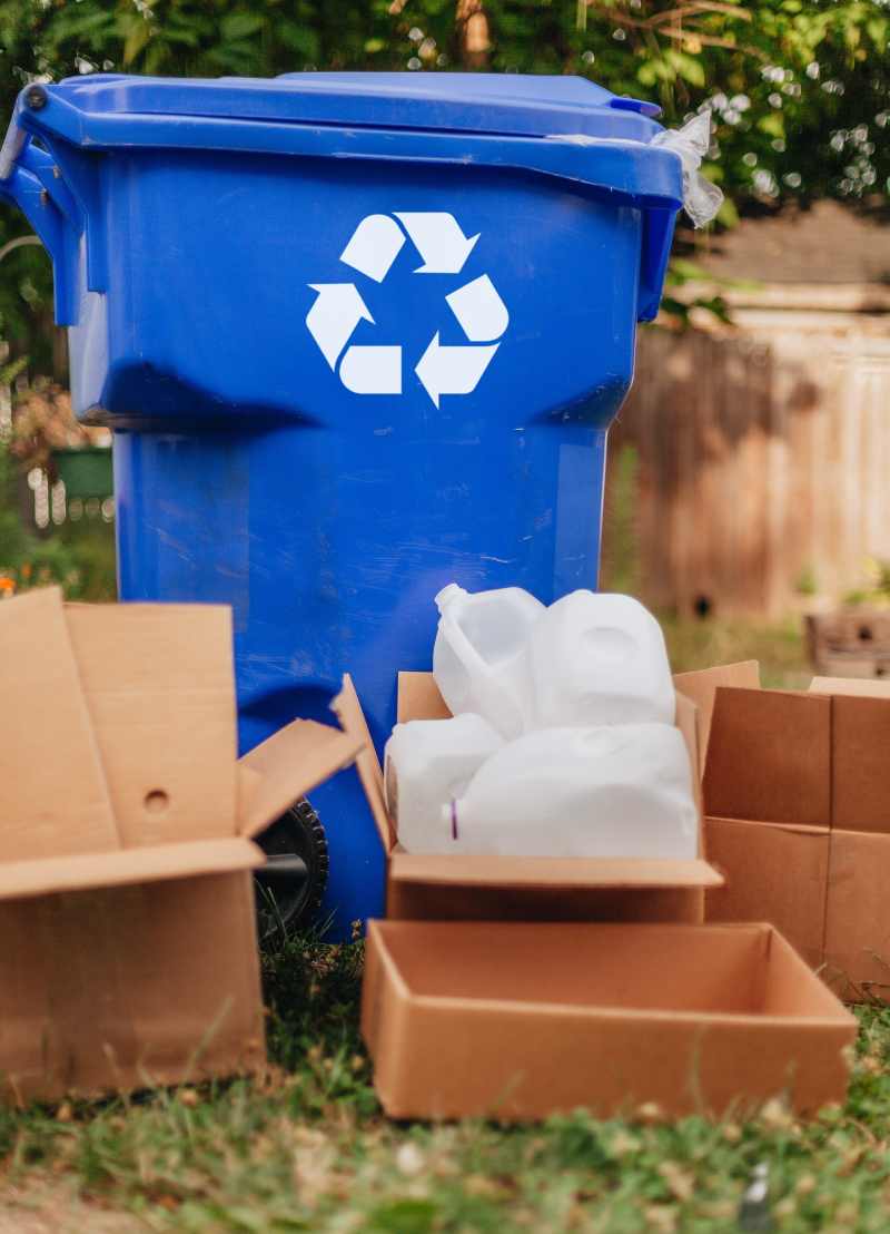 Pile of cardboard boxes and bottles